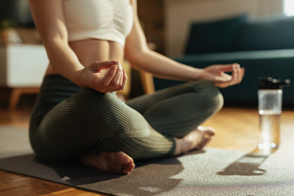Close-up of athletic woman practicing Yoga