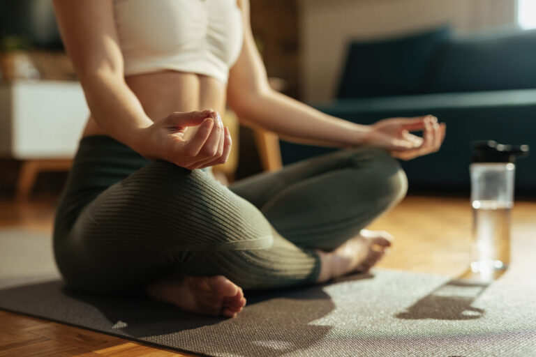 Close-up of athletic woman practicing Yoga